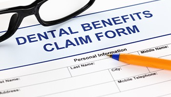 A closeup of a dental benefits claim form