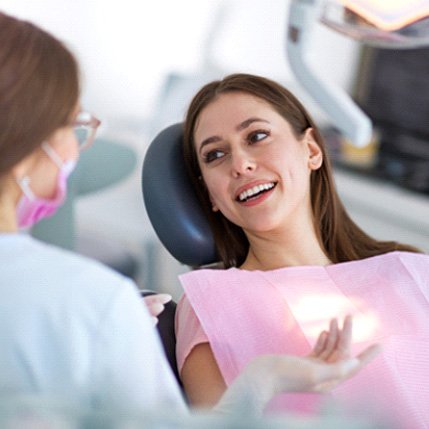 Woman smiling in the dental chair